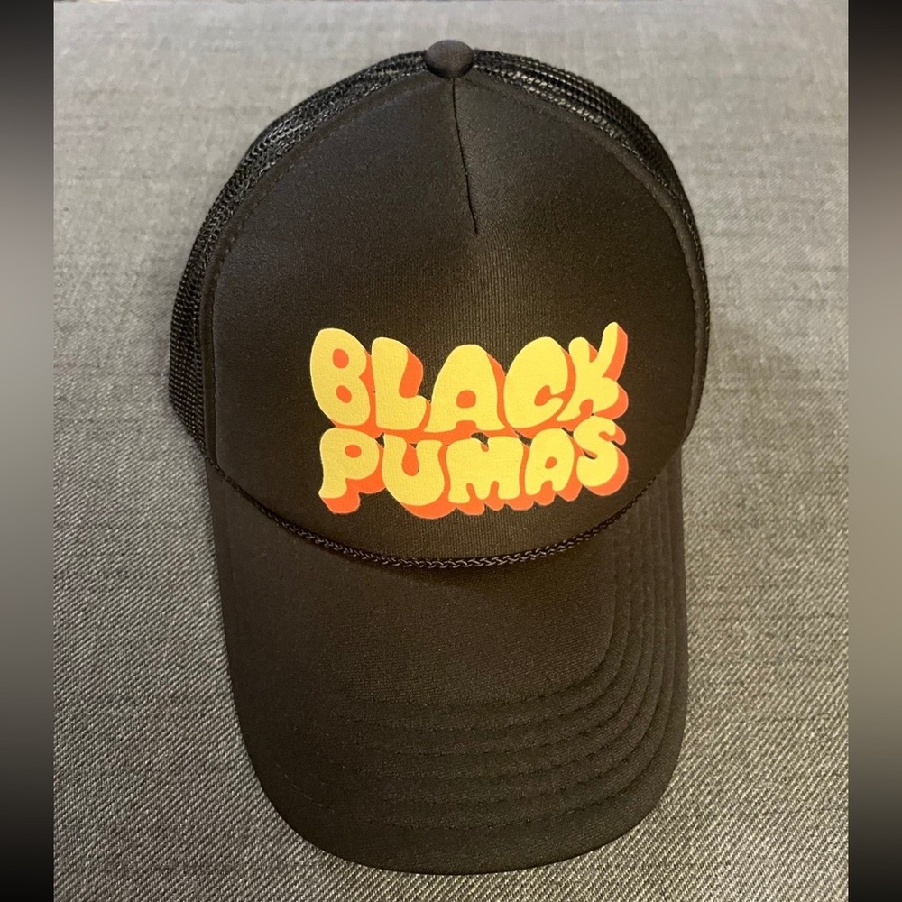 Black pumas trucker hat